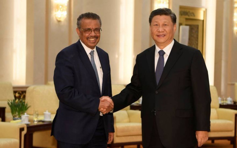Tedros Adhanom y Xi Jinping